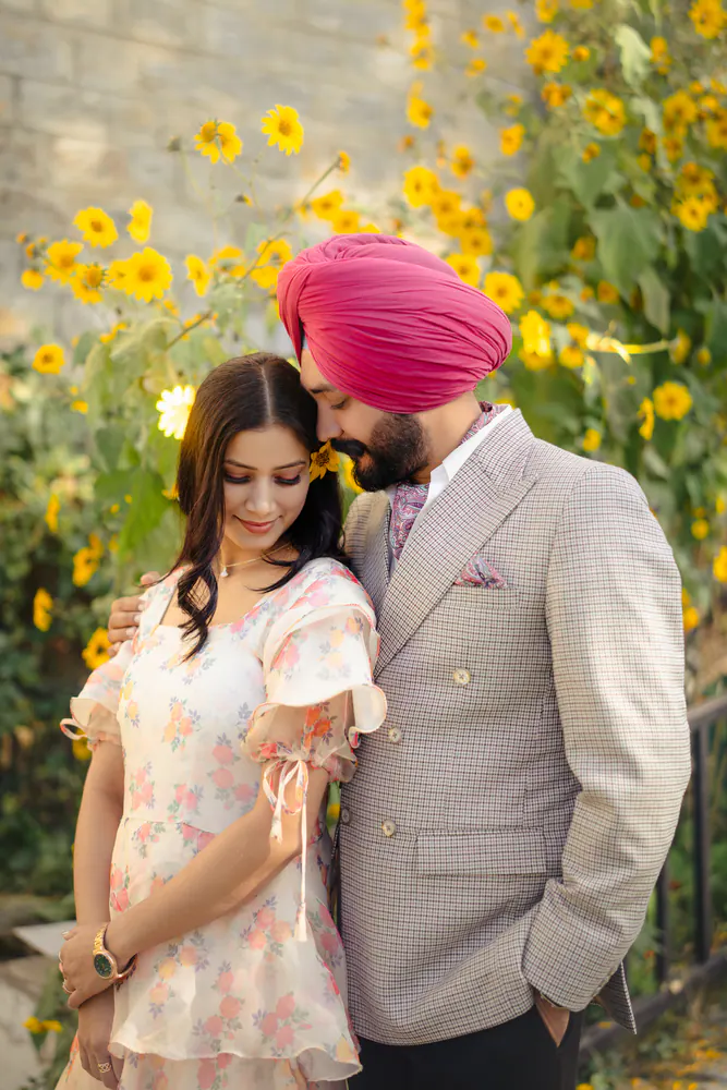 Couple embracing among sunflowers